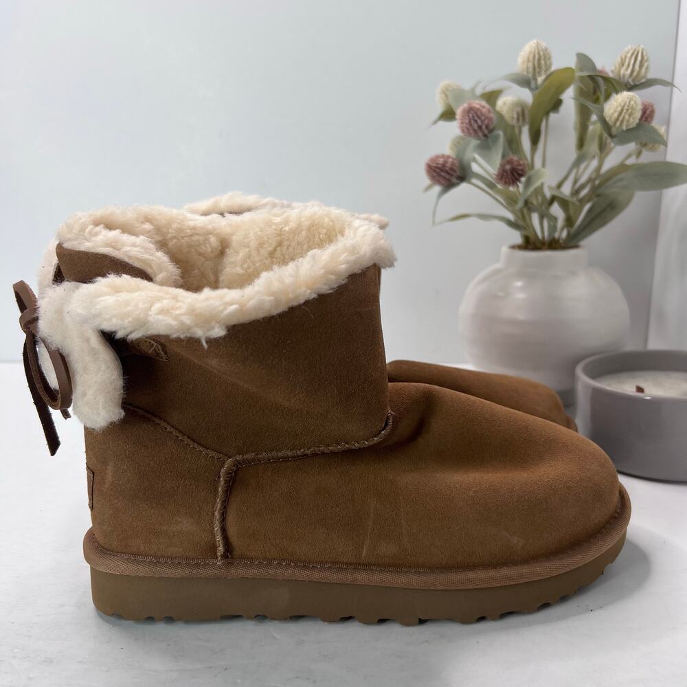 UGG Classic Double Bow Mini Suede Shearling Boot Chestnut Women 7 NWOB FLAW